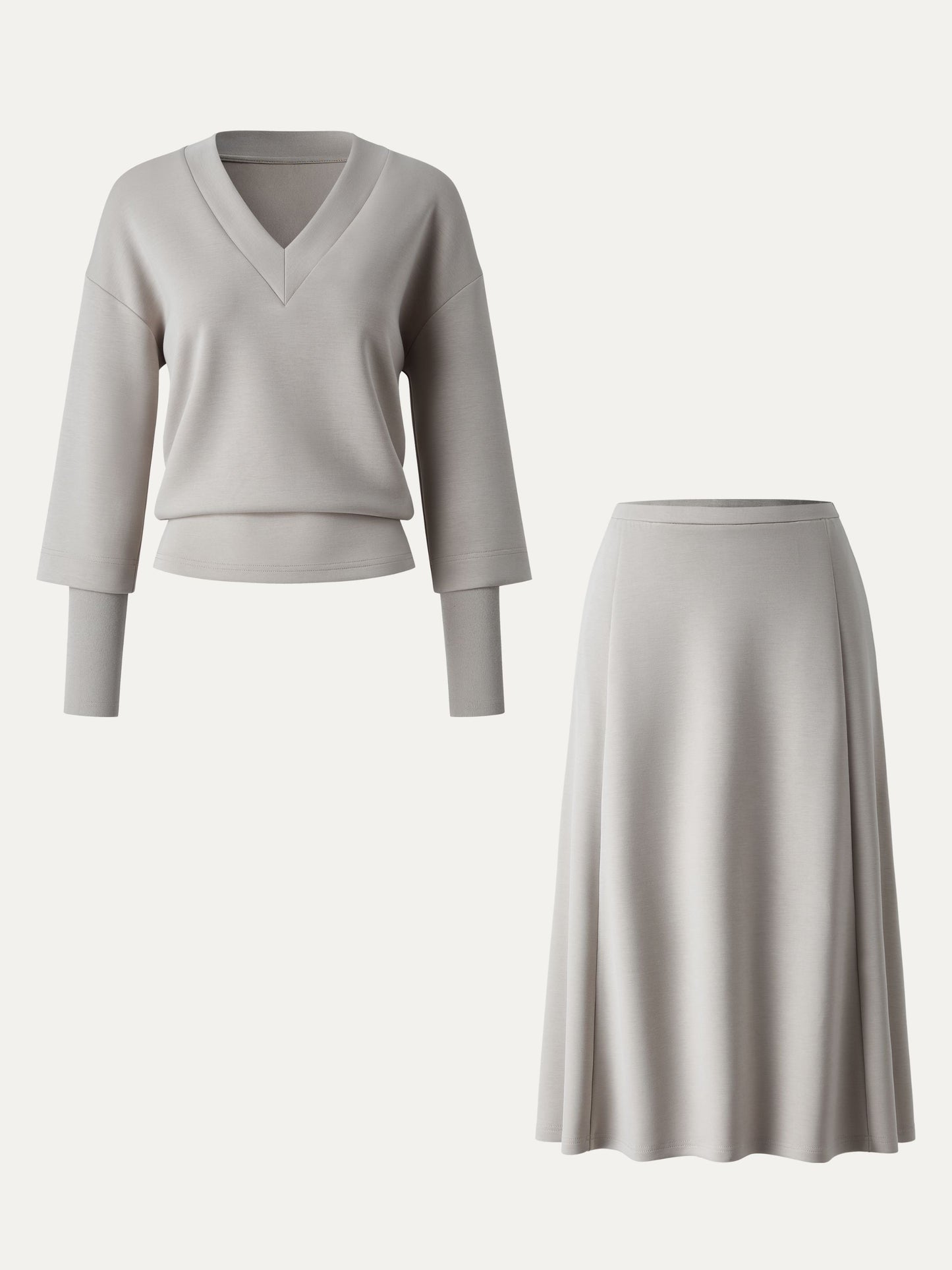Ensemble deux-pièces avec haut à col en V et jupes midi évasées avec chauffe-manches